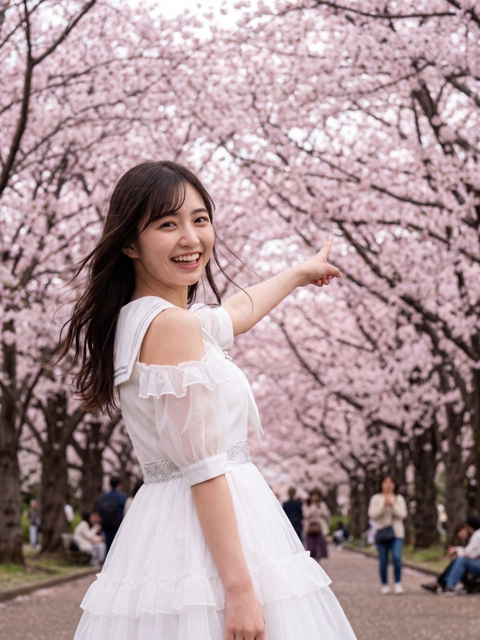 桜並木を指差すさくら